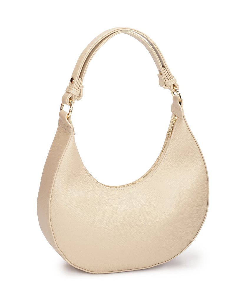 Kazar-Beigefarbene-Lederhandtasche-mit-einer-einzigartigen-Form-beige