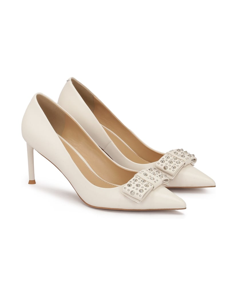 Kazar-Cremefarbene-Pumps-mit-Strassschleife-weiss