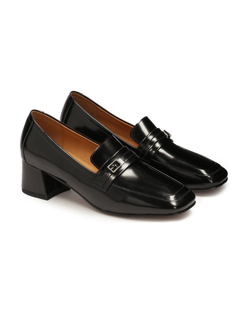 Kazar-Schwarze-Pumps-auf-einem-Block-aus-glänzendem-Leder-schwarz