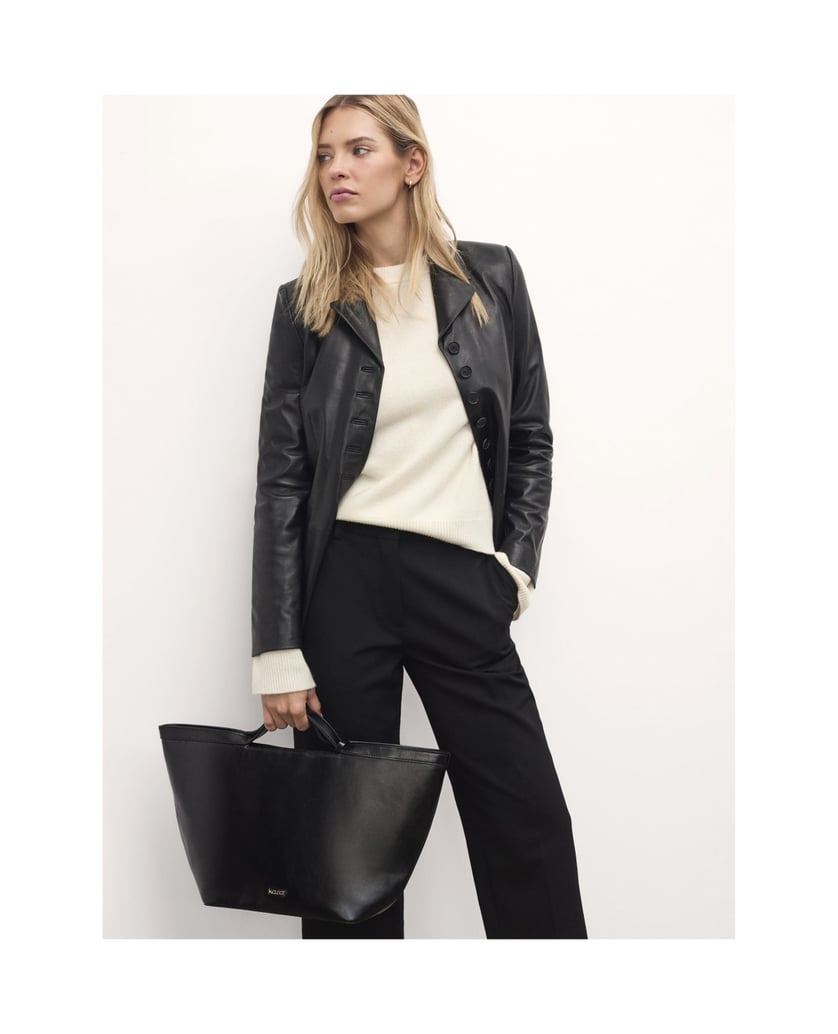 Kazar-Elegante-schwarze-Lederhandtasche-mit-goldenem-Logo-schwarz