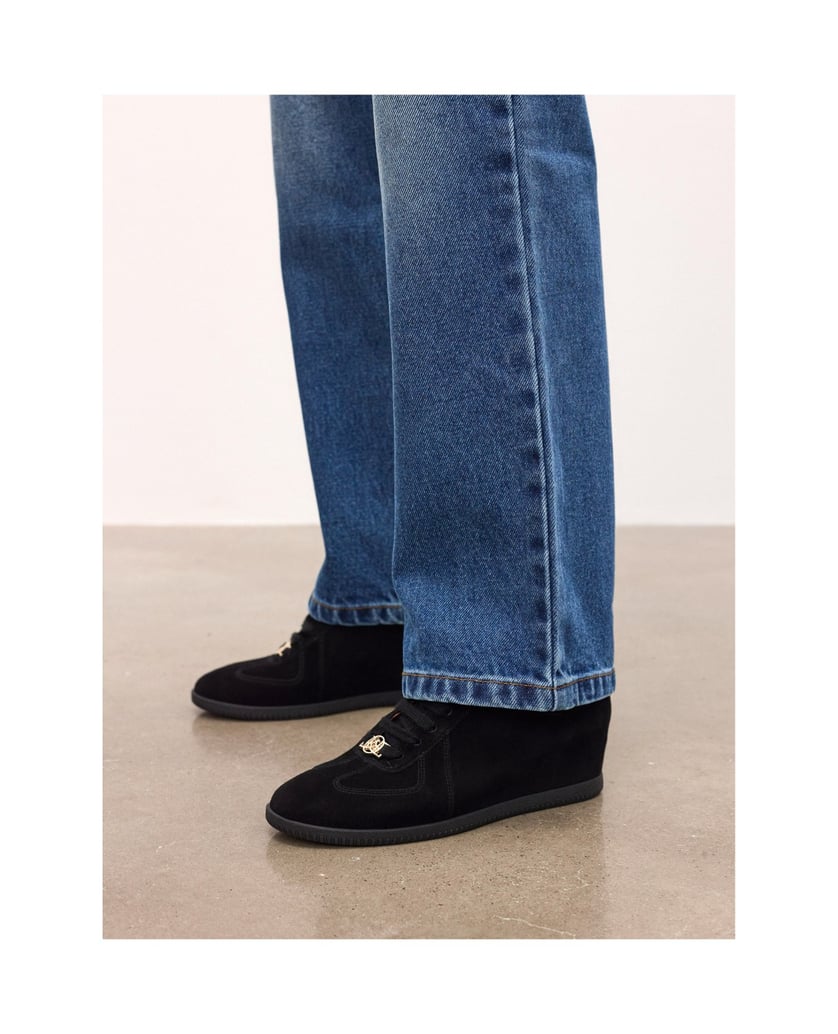 Kazar-Schwarze-Turnschuhe-an-einem-versteckten-Anker-schwarz