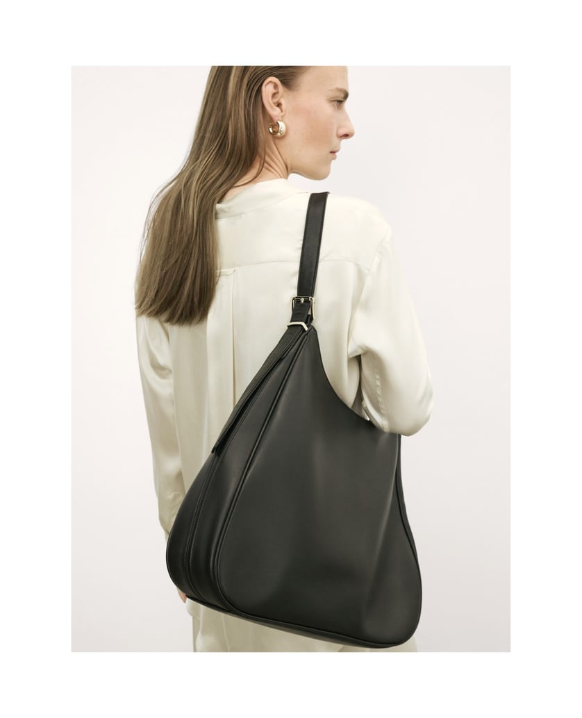 Kazar-Elegante-schwarze-Lederhandtasche-mit-trapezförmiger-Form-schwarz