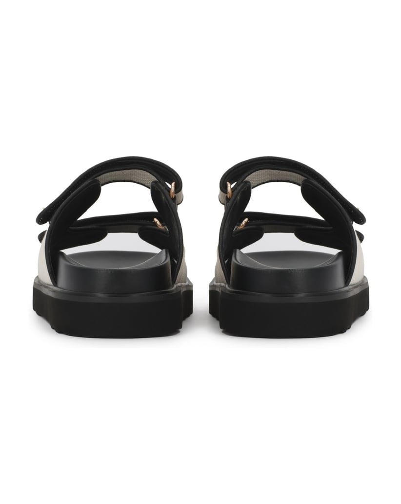 Kazar-Flip-Flops-aus-Bast-und-Leder-mit-Monogramm-auf-einer-profilierten-Sohle-beige