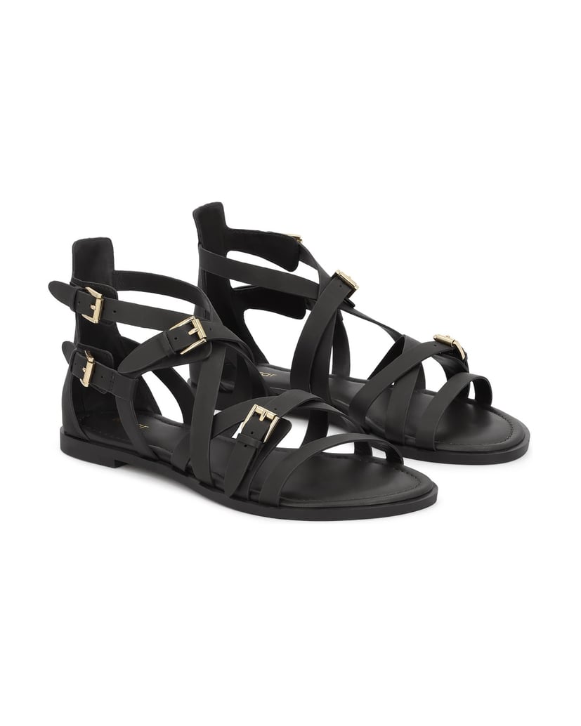 Kazar-Schwarze-Sandalen-mit-Riemen,-die-sich-um-den-Fuß-wickeln-schwarz