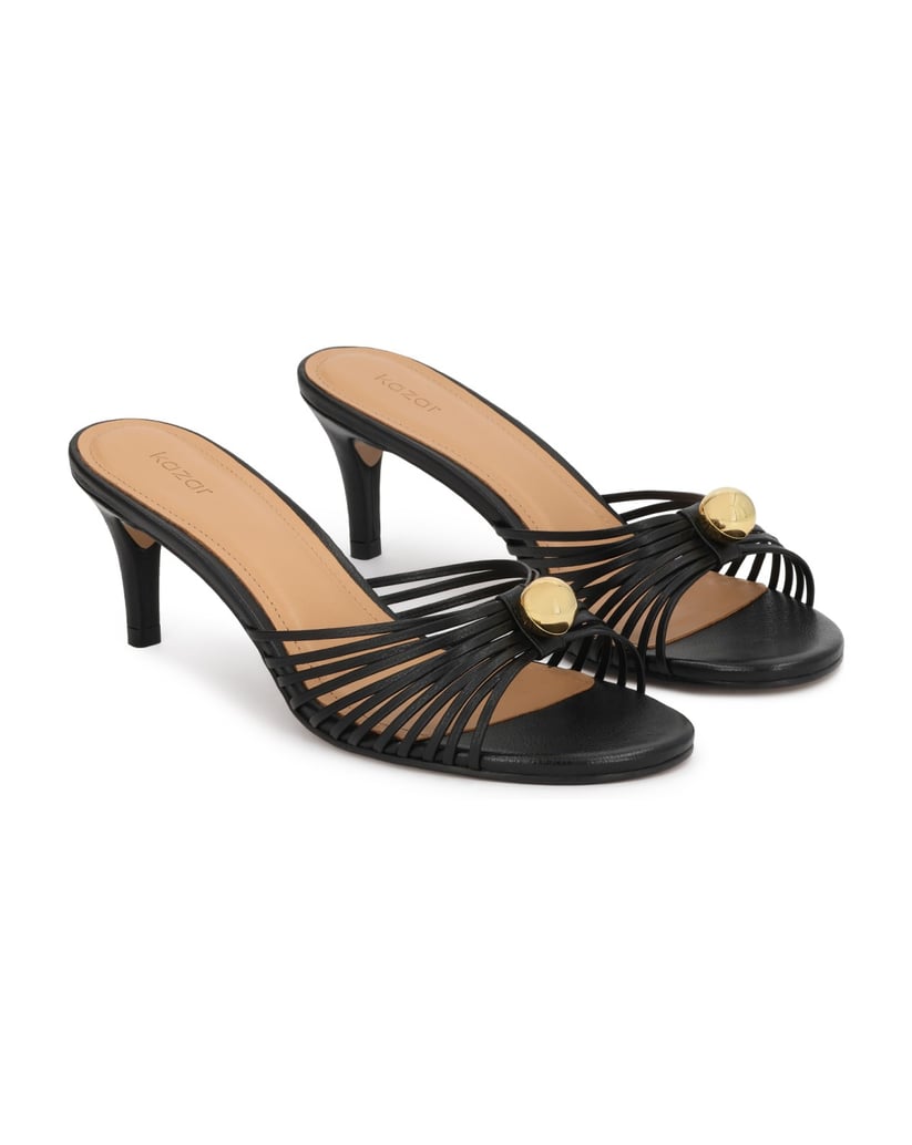 Kazar-Schwarze-Stiletto-Flip-Flops-mit-auffälligen-goldenen-Verzierungen-schwarz
