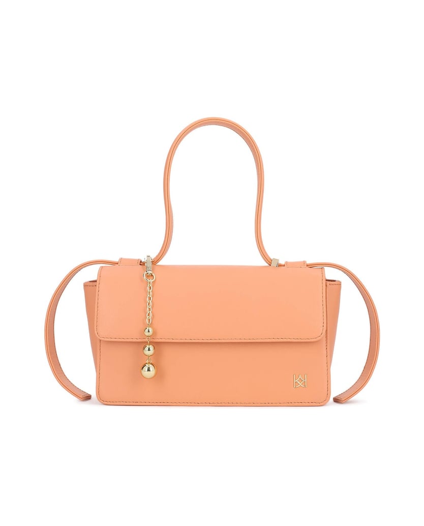 Kazar-Orange-längliche-Tasche-mit-Ziergürtel-und-Schlüsselanhängern-orange