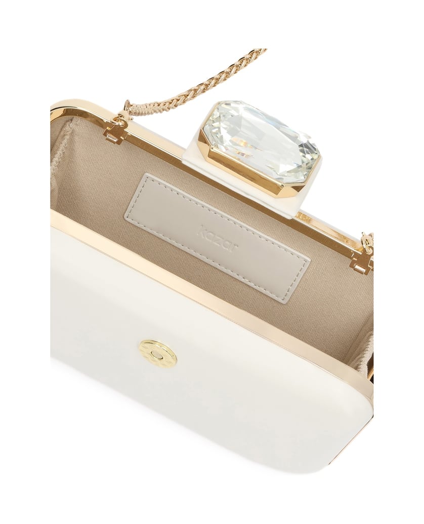 Kazar-Clutches-aus-Leder-zur-Hochzeit-in-einem-weißen-Farbton-mit-einem-Zierstein-weiss
