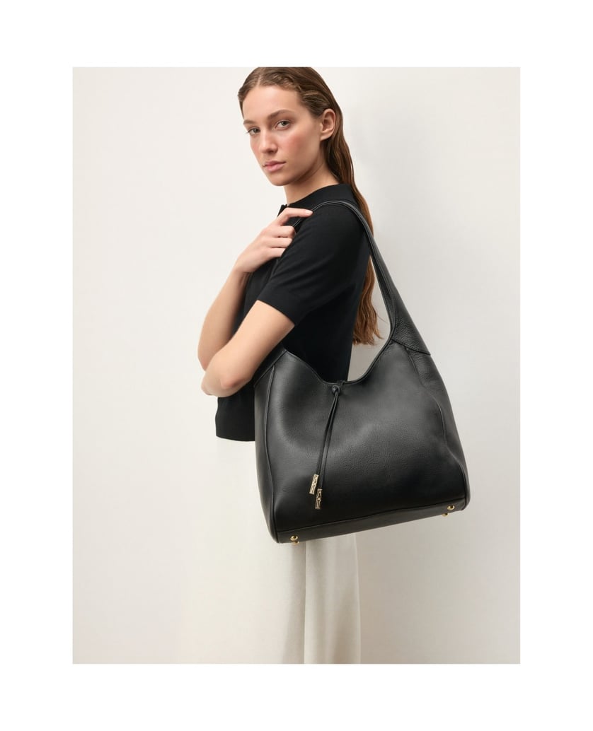 Kazar-Schwarze-Tasche-mit-dekorativen-Gürteln-schwarz